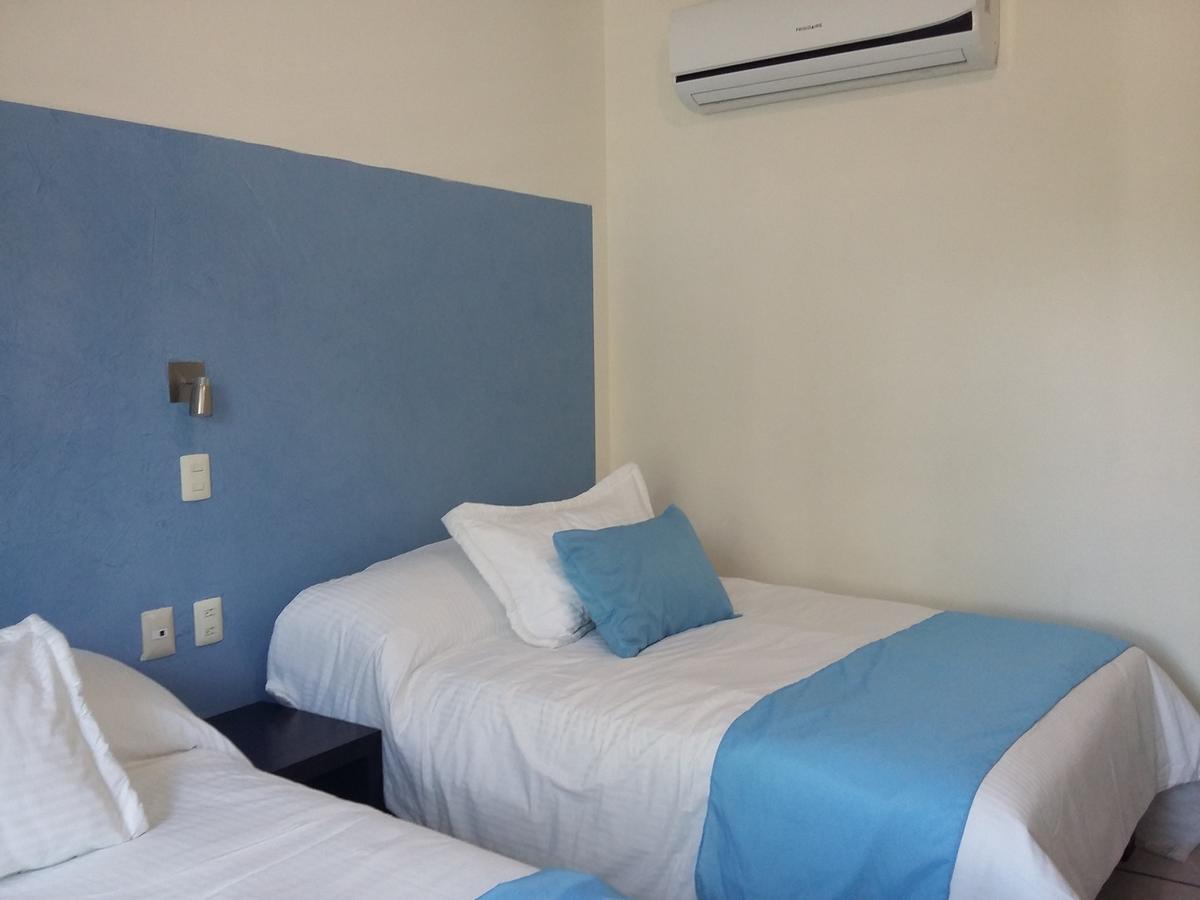 Hotel Rv มาร์ติเนซ เดอ ลา ทอเร ภายนอก รูปภาพ